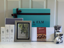 Load image into Gallery viewer, Gilly Goat Baby Products, Wedgwood Vera Wang Noir Frame, Chocolatier Chocolates, Mews Candle
